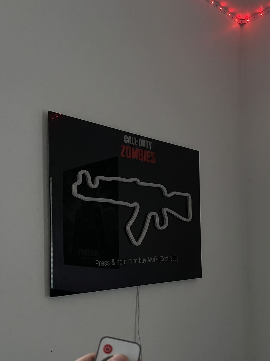 The sign powered off — a dark acrylic panel on the wall