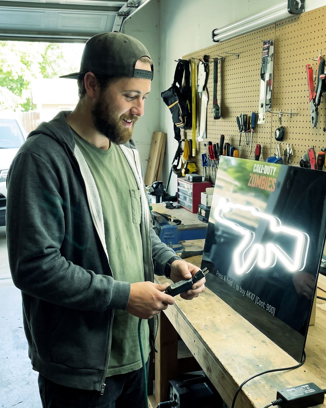 A sign lit on the workbench